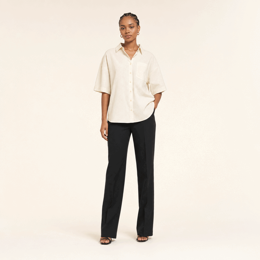 Model showing a relaxed-fit top
